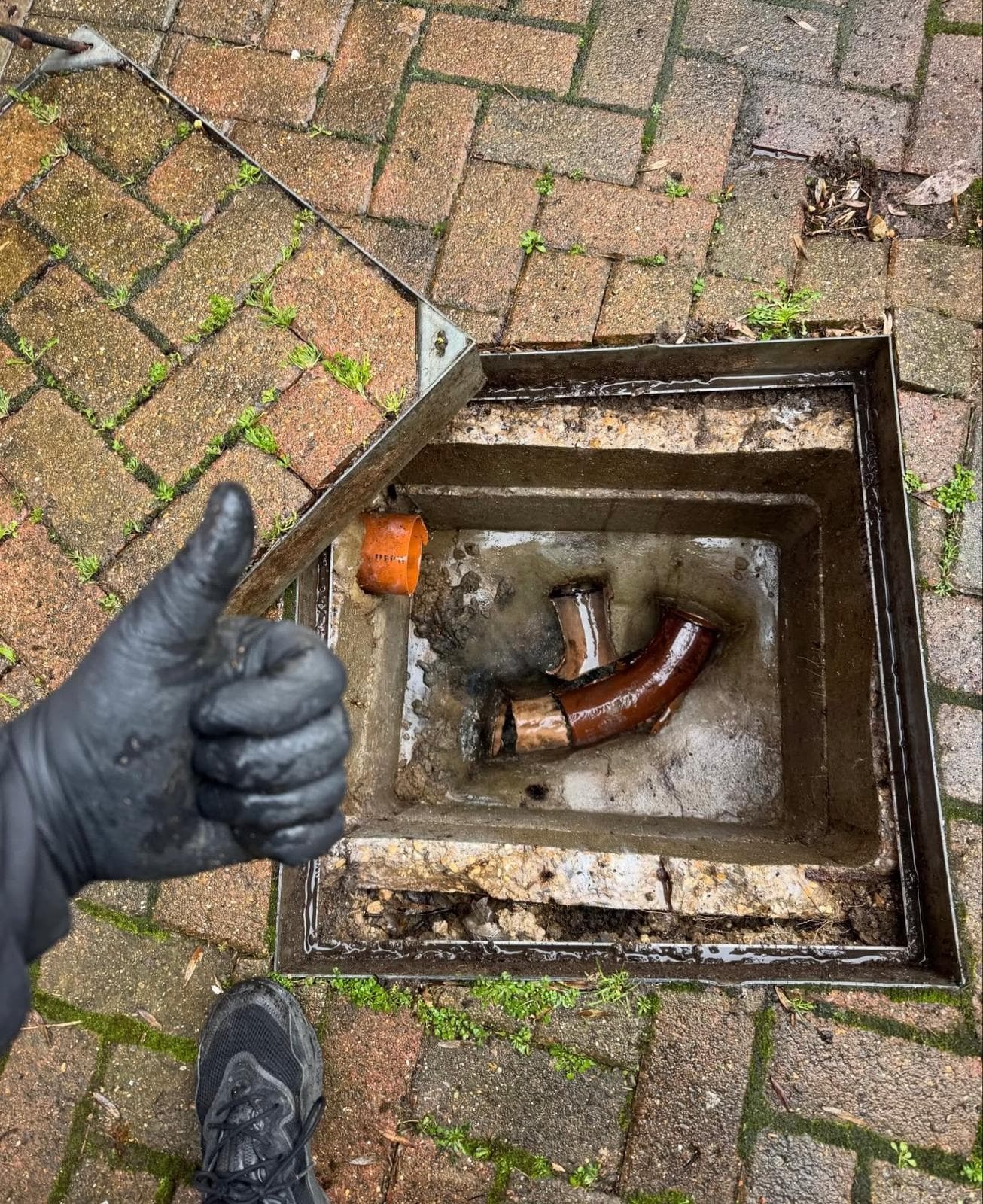 New drainage pipework fitted in an inspection chamber