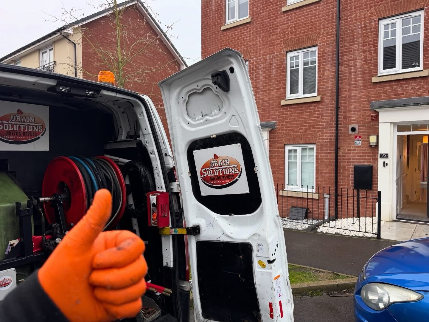 Drain Solutions MK van at a residential job — job done
