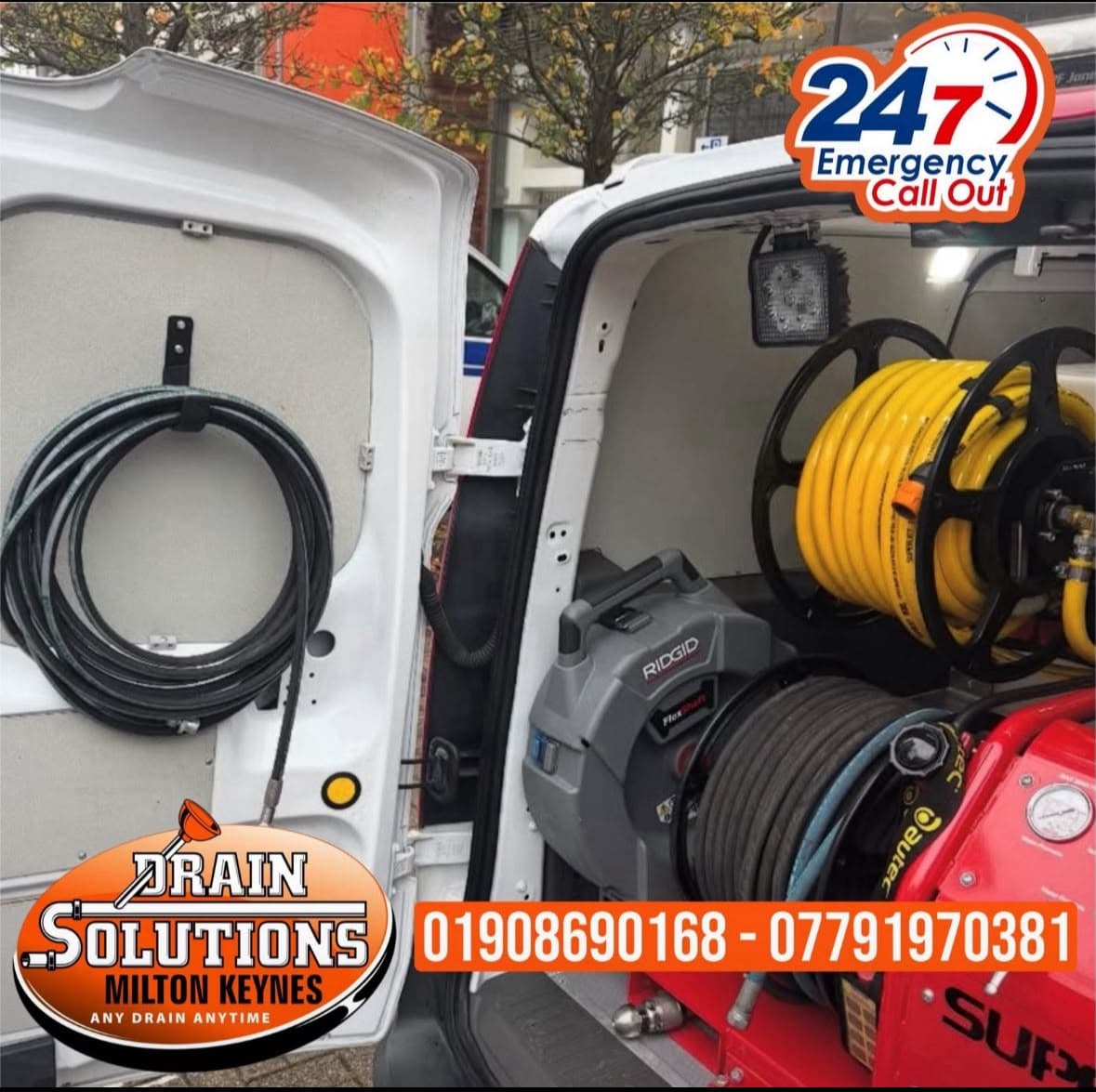 Fully-equipped Drain Solutions van interior — hose reels and pump equipment